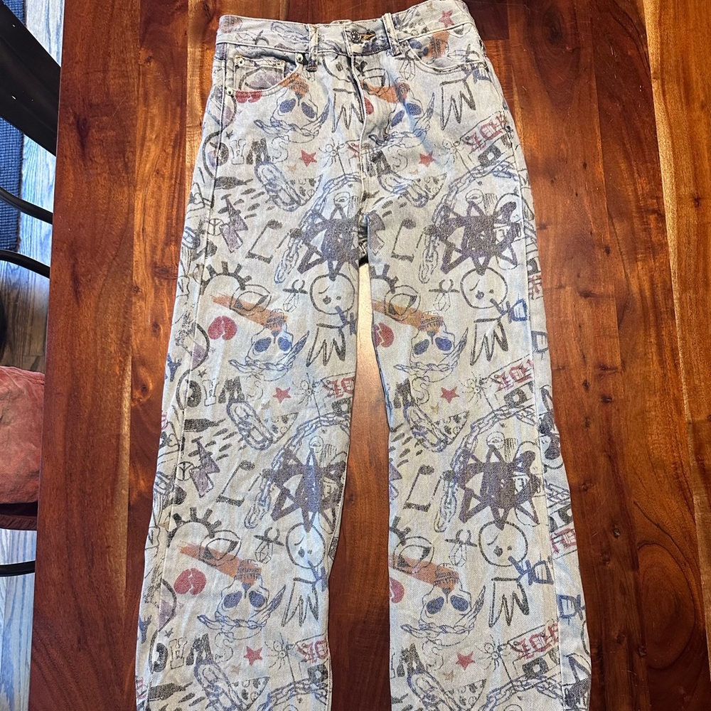 Adika jeans, size Small, graffiti print